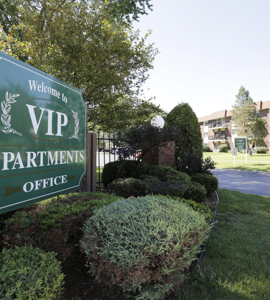 VIP Apartment Homes sign outside building